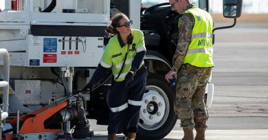 Royal Australian Air Force and US Air Force refuelling specialists discuss the refuel of a KC-135 following its arrival at RAAF Base Darwin for Exercise Mobility Guardian. Story by Flight Lieutenant Claire Campbell. Photo bySergeant Pete Gammie.