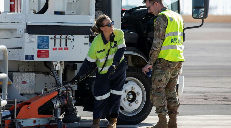 Royal Australian Air Force and US Air Force refuelling specialists discuss the refuel of a KC-135 following its arrival at RAAF Base Darwin for Exercise Mobility Guardian. Story by Flight Lieutenant Claire Campbell. Photo bySergeant Pete Gammie.