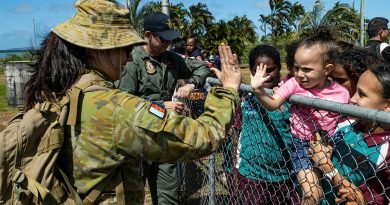 Corporal Jordan Oakley and Corporal Ashleigh Shannon greet members of the Badu Island community, during Exercise Coastwatcher Wallaby 23. Story by Corporal Jordan Oakley and Corporal Ashleigh Shannon greet members of the Badu Island community, during Exercise Coastwatcher Wallaby 23. Photos: Private Dean Armstrong. Photos by Private Dean Armstrong.