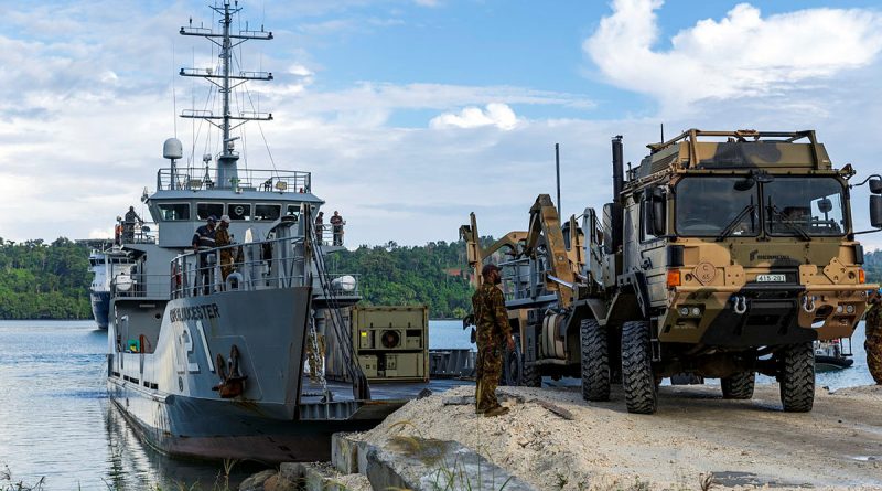 An Australian Army vehicle reception party from the 3rd Combat Engineer Regiment move stores from HMPNGS Cape Gloucester onto Manus Island, in support of Exercise Puk Puk 2023. Story by Lieutenant Carolyn Martin. Photo by Corporal Lisa Sherman.