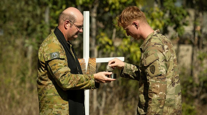 Australian Army Chaplain Major Haydn Parsons serving communion to US Army personnel during Exercise Talisman Sabre 2023 at Camp Growl in the Shoalwater Bay Training Area. Story and photos by Corporal Jacob Joseph.