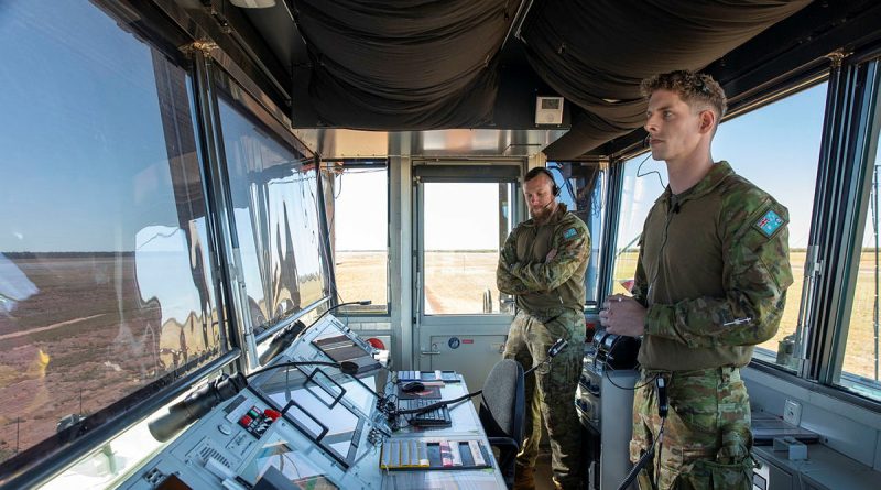 Royal Australian Air Force air traffic control officers Flying Officer Adam Roberts and Flying Officer Leigh Cremin in the transportable air operations tower at RAAF Base Curtin, WA, during Exercise Talisman Sabre 2023. Story by Flying Officer Connor Bellhouse. Photos by Leading Aircraftwoman Annika Smit.