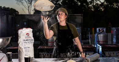 Australian Army cook Corporal Samantha Kenafake, of 10th Force Support Battalion, prepares pizza for soldiers at Camp Growl, Shoalwater Bay Training Area, during Exercise Talisman Sabre 2023. Story by Captain Diana Jennings. Photos by Sergeant Sagi Biderman.