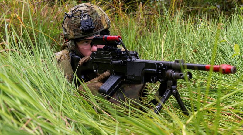 Private Thomas Adamson with a Minimi machine gun during protection operations by Battle Group Waratah in and around the town of Ingham, Queensland during Exercise Talisman Sabre 2023. Story by Major Jesse Robilliard. Photo by Corporal Michael Currie.