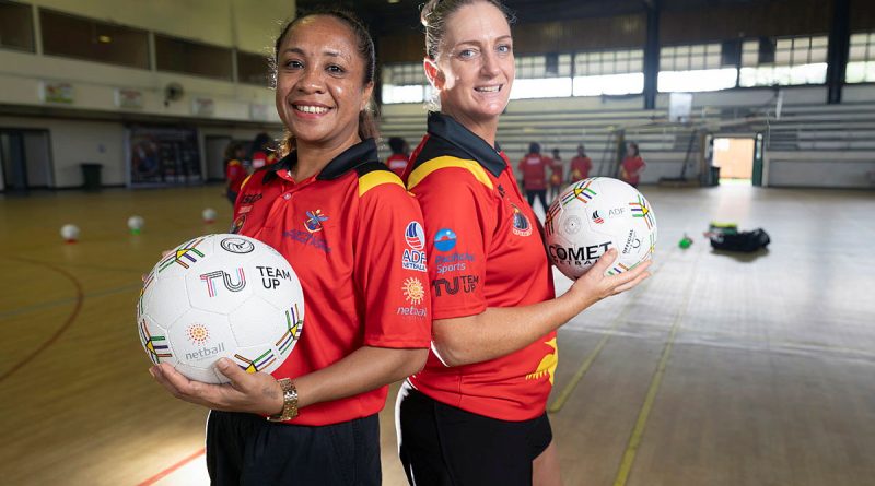 Tui Alu, left, and Warrant Officer Class 1 Kimberly Kiely at the ADF Sports training program at the Sir Ignatius Kilage Stadium Gymnasium, Lae, Papua New Guinea. Story by Squadron Leader Amanda Scott. Photos by Leading Seaman Matthew Lyall.