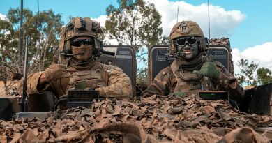 Australian Army Private Samuel Austen-Wilkins, left, and His Majesty's Armed Forces of Tonga Lance Corporal Sione Atoa mounted in an Australian Army Boxer combat reconnaissance vehicle during Exercise Talisman Sabre. Story by Major Roger Brennan. Photos by Corporal Nicole Dorrett.