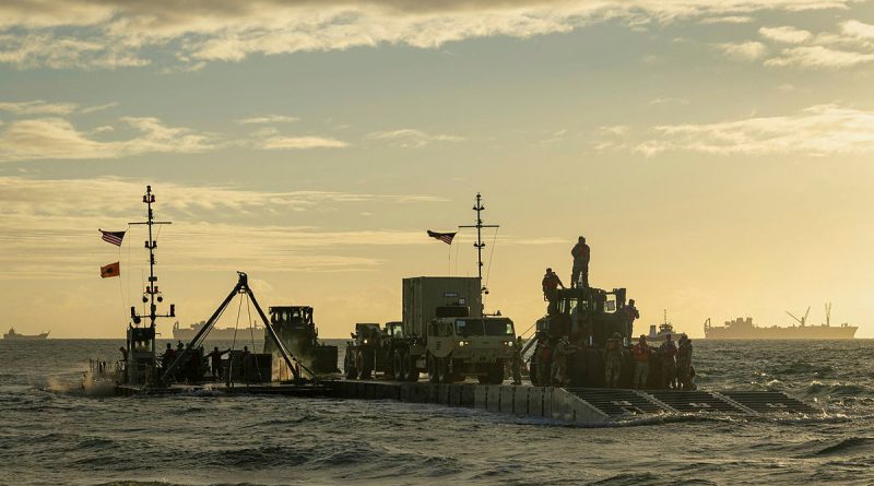 A US Army floating causeway approaches the shore in Bowen North Queensland during Exercise Talisman Sabre, marking the opening of joint logistics over the shore activities. Story and photos by Corporal Jacob Joseph.