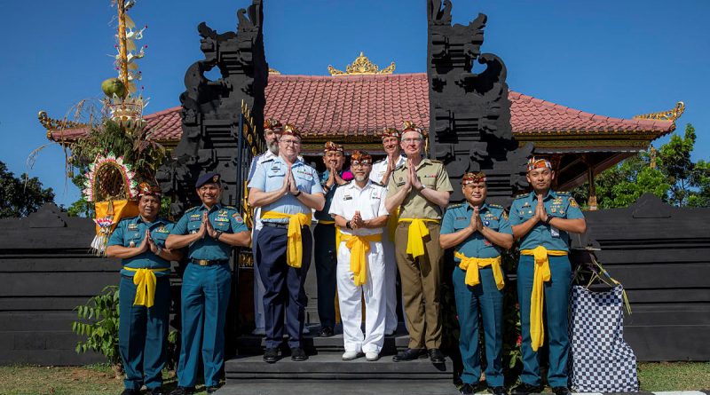 ADF chaplains Rainer Schack, Andrew Robinson, Christopher Buckley-Wilkshire, Imam, Mogamat Majidih Essa and Commander Mark Graichen visit a Hindu temple with members of the Indonesian Navy in Surabaya, Indonesia, during Indo-Pacific Endeavour 2023. Story by Lieutenant Emily Tinker. Photos by Sergeant Craig Barrett.