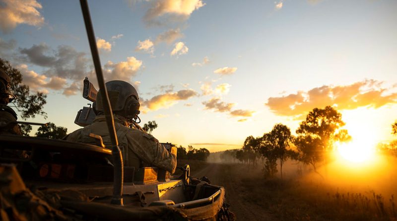 An Australian Army soldier from the 2nd Cavalry Regiment after a combined arms live-fire serial on Exercise Brolga Sprint 23 at Townsville Field Training Area, Queensland. Story by Captain Joanne Leca. Photos by Lance Corporal Riley Blennerhassett.