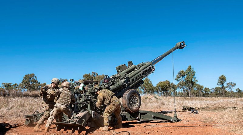 Army soldiers from Australia's 4th Regiment, Royal Australian Artillery, and United States' 11th Field Artillery Regiment work together during a combined arms live-fire serial on Exercise Brolga Sprint 23 at the Townsville Field Training Area, Queensland. Story by Captain Joanne Leca. Photo by Lance Corporal Riley Blennerhassett.