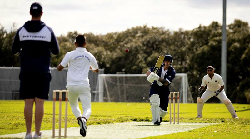 Warrant Officer Corey Evans hits the ball as personnel from the Indian and Australian navies compete in a game of cricket as part of Exercise Malabar’s shore phase in Sydney, NSW. Story by Sub-Lieutenant Tahlia Merigan. Photo by Leading Seaman David Cox.