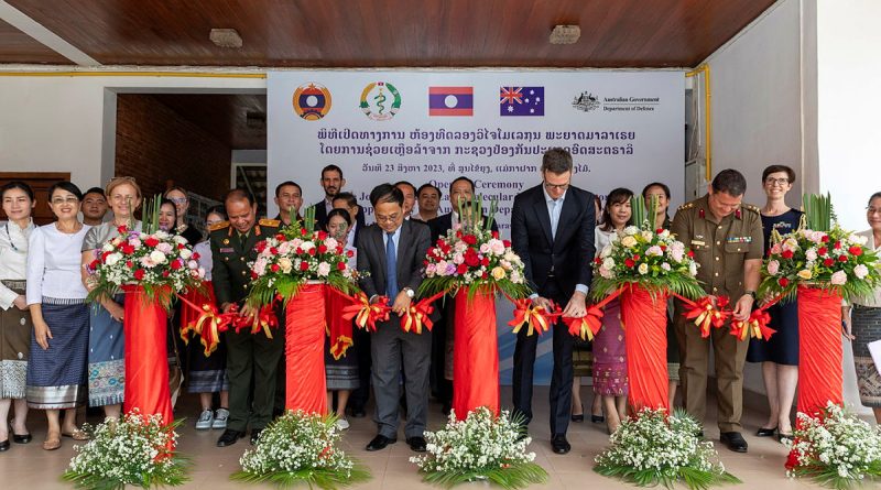 Australian and Laos VIP representatives cut the ribbons to officially open the joint Australia-Laos Molecular Malaria Laboratory in Ventiane, Laos during Indo-Pacific Endeavour 2023. Story by Flight Lieutenant Nick O’Connor. Photo by Leading Aircraftwoman Annika Smit.