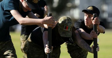 Youth from Reclink participate in a fitness session during 1st Armoured Regiment's Look at Life activity at RAAF Base Edinburgh, SA. Story by Captain Peter March. Photos by Sergeant Peng Zhang.
