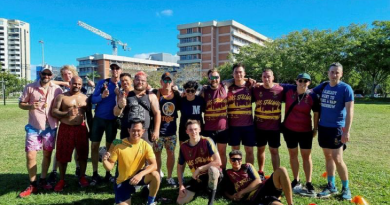 Sailors from HMCS Montreal and HMAS Stalwart after a game of soccer during the HMAS Cairns sports day at the Cairns Esplanade. Story by Corporal Michael Rogers.