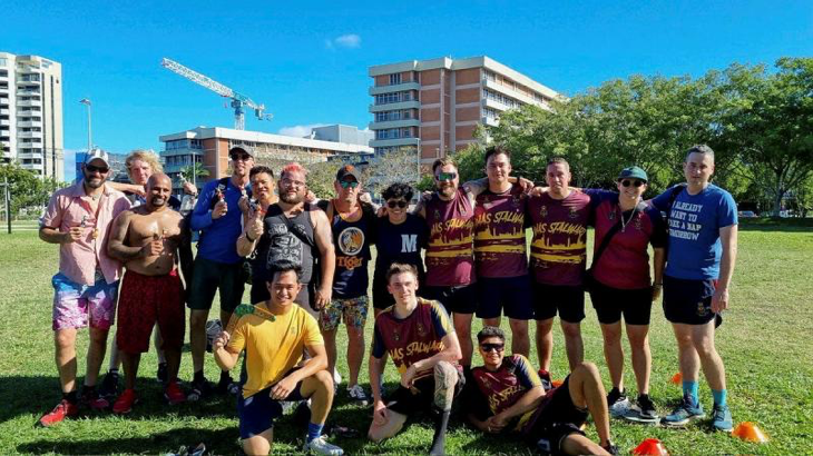 Sailors from HMCS Montreal and HMAS Stalwart after a game of soccer during the HMAS Cairns sports day at the Cairns Esplanade. Story by Corporal Michael Rogers.