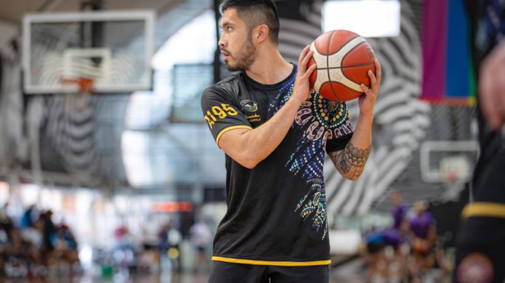 Leading Seaman Manuel Salas participates in a basketball competition as part of the Exercise Malabar 2023 shore phase in Sydney, NSW. Story by Lieutenant Marcus Middleton. Photo by Leading Seaman Matthew Lyall.