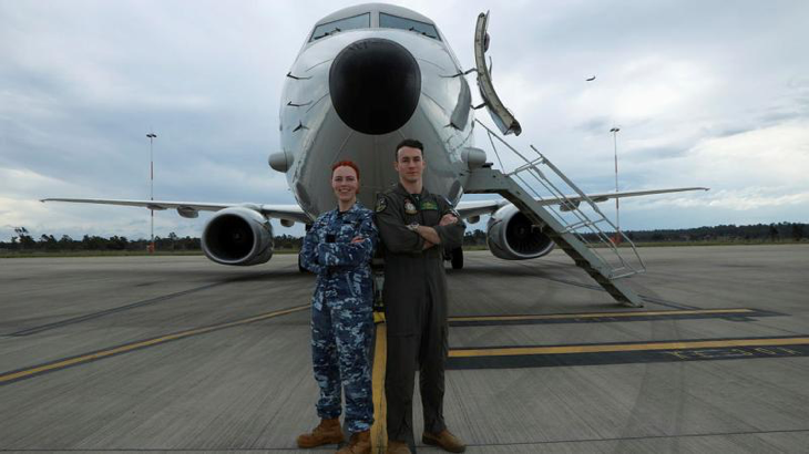 Leading Aircraftwoman Buj Nike and Flying Officer Lincoln Rolfe stand in front of a P-8A Poseidon aircraft at RAAF Base Amberley. Story by Flight Lieutenant Claire Burnet. Photo by Private Dean Armstrong