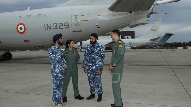 RAAF country liaison officers Flight Lieutenants Inderbir Singh (left) and Darpan Dhawan chat with Indian Navy naval air operations officer INAS 312 Lieutenant Sanjana Kamat and qualified navigation instructor INAS 316 Lieutenant Commander Lokesh Kumar (right). Story by Flight Lieutenant Claire Burnet. Photo by Private Dean Armstrong.