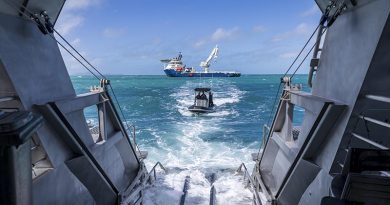 Queensland Police Service assist Royal Australian Navy Mine Warfare and Clearance Diving Task Group alongside Australian Defence Vessel Reliant, during the MRH-90 Taipan recovery in the Whitsunday Islands. Photo by Corporal Lisa Sherman.