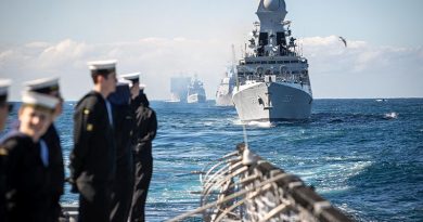 HMAS Brisbane's ship’s company observe the Sydney Harbour fleet entry for Exercise Malabar 2023. Photo by Leading Seaman Matthew Lyall.