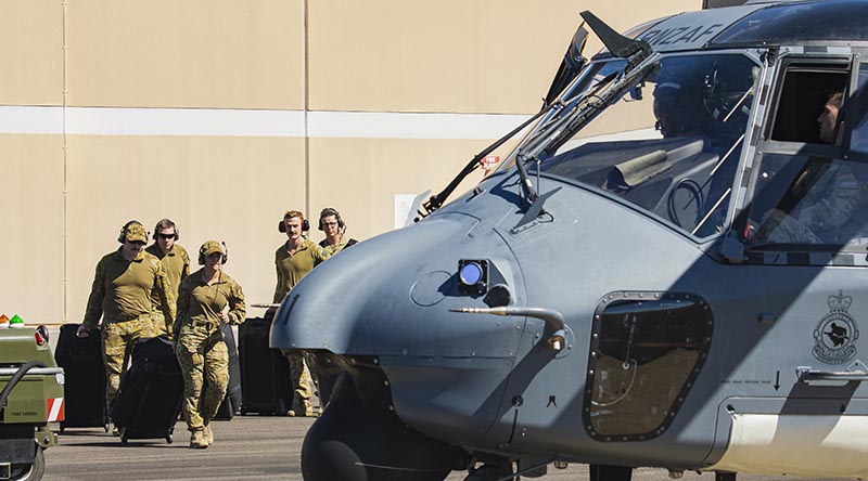 Australian Army soldiers from 131 Battery, Royal Australian Artillery, approach a Royal New Zealand Air Force NH90 helicopter during Exercise Talisman Sabre 2023 at RAAF Base Townsville. Photo by Leading Aircraftman Ryan Howell.