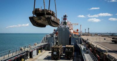 An Australian Army M1A1 Abrams tank is loaded onto the USAV SSGT. Robert T. Kuroda at the Port of Darwin, NT, bound for Indonesia for Exercise Super Garuda Shield 23. Photo by Captain Annie Richardson.