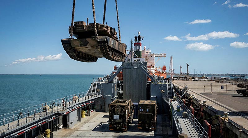 An Australian Army M1A1 Abrams tank is loaded onto the USAV SSGT. Robert T. Kuroda at the Port of Darwin, NT, bound for Indonesia for Exercise Super Garuda Shield 23. Photo by Captain Annie Richardson.