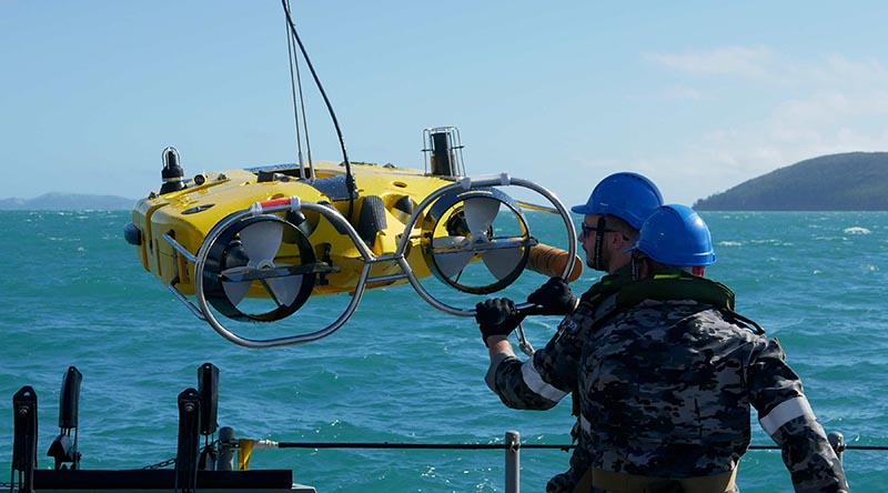 Royal Australian Navy sailors from HMAS Huon conduct search operations in the Whitsundays in the search for debris from the missing MRH-90. Photo by Able Seaman Casey Buurveld.