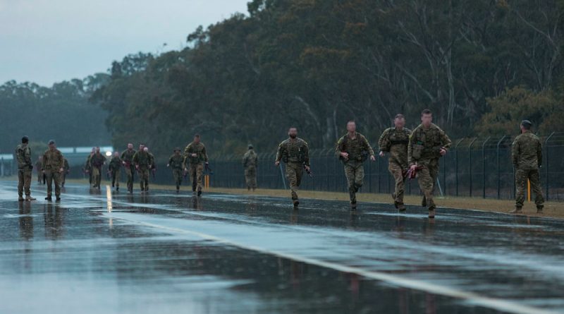 ADF candidates participating in the 4 Squadron Combat Control Suitability Screening do a 3.2km run in the rain as part of the Special Forces entry test. Story by Flight Lieutenant Rob Hodgson. Photos by Aircraftwoman Laura Flower.