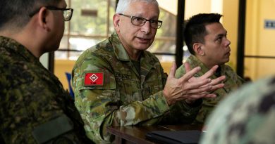 Australian Army medical officer Major Peter Del Fante has a discussion with Armed Forces of the Philippines and United States Navy personnel during Forward Deployable Preventative Medicine Unit training at La Union High School in the Philippines for Exercise Pacific Partnership 2023Story by Warrant Officer Class Two Max Bree. Photos by Sergeant David Said.