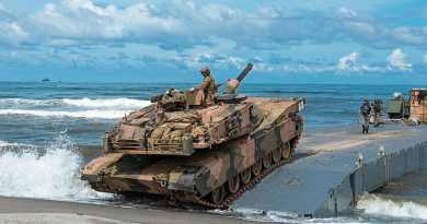 An Australian Army M1A1 Abrams tank from the 2nd Cavalry Regiment hits the shore during a combined amphibious assault activity on Exercise Alon in the Philippines. Story by Squadron Leader Courtney Jay. Photos by Lance Corporal Riley Blennerhassett.