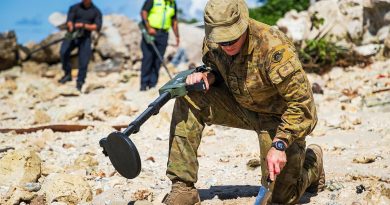 Australian Army Lance Corporal Lobenzo Humberto Meneses inspects an area of interest during Operation Render Safe, Nauru. Story by Captain Karam Louli. Photos by Corporal Sam Price.