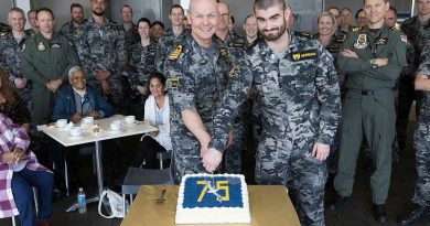 Commanding Officer HMAS Albatross, Captain Scott Palmer and the youngest sailor aboard, Able Seaman Casey Merriman slice a birthday cake during 75th anniversary celebrations for HMAS Albatross. Story by Sub Lieutenant Jaclyn Bollock. Photos by Petty Officer Peter Thompson.