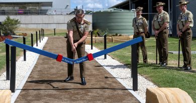 Commander 6th Brigade Brigadier Greg Novak uses the ceremonial axe to officially open the 6th Engineer Support Regiment Memorial Walk at RAAF Base Amberley, Queensland. Story by Captain Evita Ryan. Photos by Warrant Officer Class 2 Kim Allen.