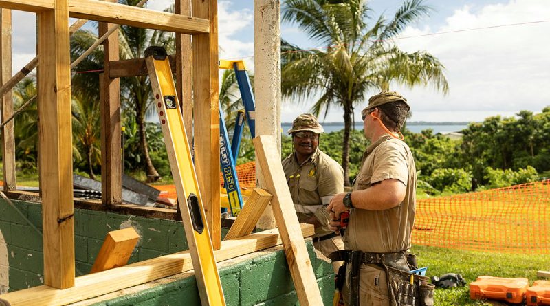 An Australian Army sapper and a soldier of the Papua New Guinea Defence Force help renovate a school during Exercise Puk Puk, Manus Island, Papua New Guinea. Story by Major Taylor Lynch. Photos by Corporal Brandon Grey.