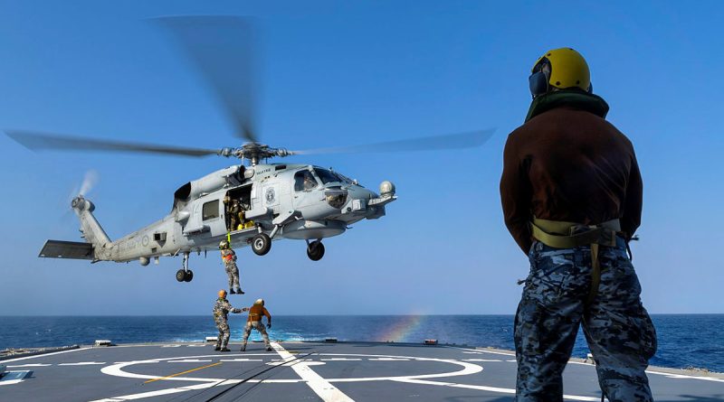 Royal Australian Navy sailors and officers from HMAS Toowoomba’s embarked MH-60R aircraft “Valkyrie” transfer passengers during an exercise off the coast of Western Australia as the ship prepares for regional presence deployment 2023. Story by Lieutenant Max Logan. Photo by Leading Seaman Ernesto Sanchez.