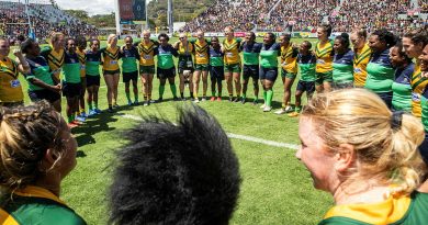 Members of the woman’s ADF Rugby League team form a huddle with the PNGDF Rugby League team after a friendly exhibition match at the Santos National Football Stadium, Port Moresby, PNG. Story by Squadron Leader Amanda Scott. Photos by Leading Seaman Matthew Lyall.