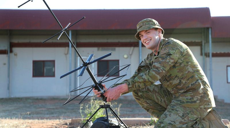 Signaller Matthew Crawford, of 8th Signal Regiment, helps 144th Signal Squadron test its high-frequency capability during Exercise Rhino Run. Story by Captain Adrienne Goode. Photos by Captain Peter March.