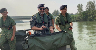Lieutenant Commander Michael Booth (Staff College Student) operating a Singapore Armed Forces bridging lighter at Selatar Camp. Story by Commander Greg Swinden.
