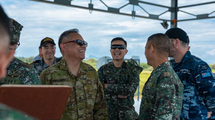 Australian Army officer Major Bayani Fernandez (centre) shares a laugh with his counterparts from the Armed Forces of the Philippines on Indo-Pacific Endeavour 2023 in the Philippines. Story by Captain Joanne Leca.