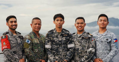 From left, RAN Able Seaman Marc Moyo, Philippine Marine Corps Master Sergeant Vincente Carubanga Jr, Australian Army Private Melanio Sager, RAN Medical Officer Lieutenant Phil Salinas and Philippine Navy Apprentice Seaman Cedrick Marcelo on HMAS Canberra near Manila, Philippines, during Exercise Alon. Story by Lieutenant Carolyn Martin. Photo by Corporal Robert Whitmore.