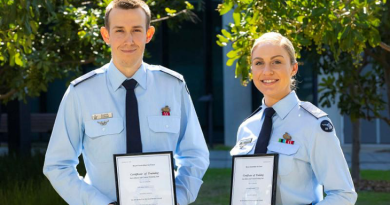 First graduates of the Air Battle Manager, Fighter Controller, Enlisted Course, Corporal Baden Oakley and Corporal Emily Smeaton with their graduation certificates at RAAF Base Williamtown in NSW. Story by Flying Officer Matthew Edwards. Photo by Sergeant Craig Barrett.