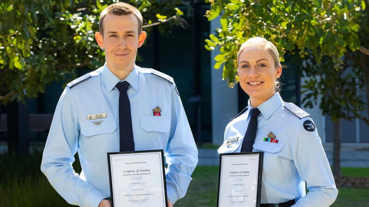 First graduates of the Air Battle Manager, Fighter Controller, Enlisted Course, Corporal Baden Oakley and Corporal Emily Smeaton with their graduation certificates at RAAF Base Williamtown in NSW. Story by Flying Officer Matthew Edwards. Photo by Sergeant Craig Barrett.