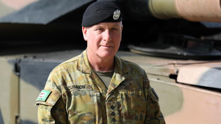 Australian Army officer Captain Robert Cussion with the M1A1 Main battle tank at RAAF Base Edinburgh, South Australia. Story by Jon Kroiter.