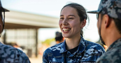 Pilot Officer Ema Kobayakawa talks with Japan Air Self-Defense Force personnel at RAAF Base Tindal, NT. Story by Flight Lieutenant Rachael Blake. Photo by Leading Aircraftwoman Taylor Anderson.