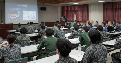 Flight Lieutenant Rosemary Callery addresses the attendees of the Women, Peace and Security networking event at Japan Air Self-Defense Force Komatsu Air Base during Exercise Bushido Guardian. Story by Flight Lieutenant Claire Campbell. Photo by Leading Aircraftman Samuel Miller.