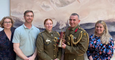 (L-R) Katia Hoffmann, Luke Giacomin, Australian Army officers Major Jess Ward, Colonel Paul Graham and Sharna Roberts with a fake vintage Western Australian University Regiment bugle. Story by Sergeant Matthew Bickerton.