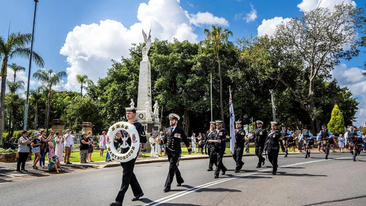 HMAS Maryborough personnel march past the Maryborough Cenotaph during their freedom-of-entry parade. Story by Midshipman Jackson Marsh.