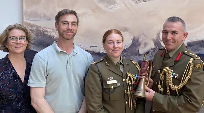 Katia Hoffmann, Luke Giacomin, Australian Army officers Major Jess Ward and Colonel Paul Graham with a fake vintage Western Australian University Regiment bugle.