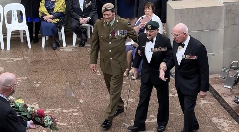 Keith Payne VC, escorted by Corporal Willie Apiata VC and Governor General David Hurley, at the Last Post Ceremony at The Australian War Memorial, before a gala dinner to celebrate his 90th birthday. Photo by Glenn Fenwick.